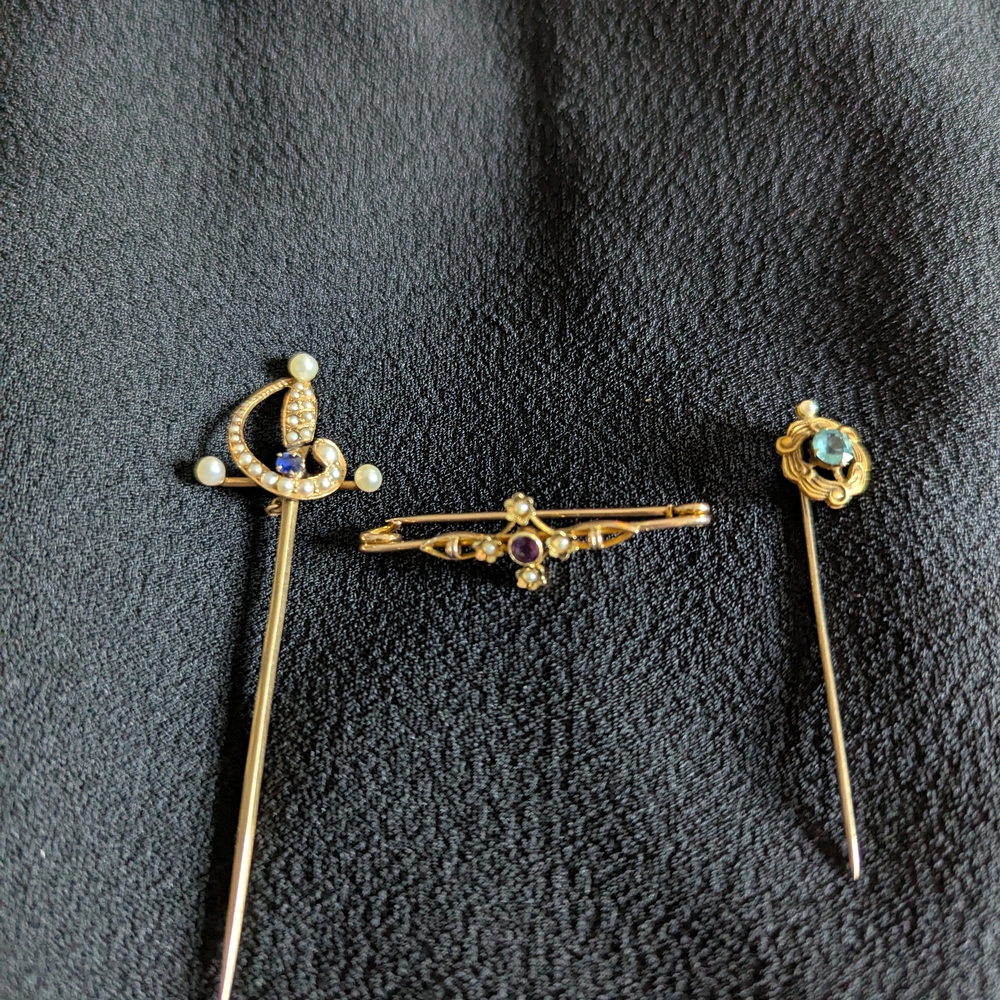 Elegant Gold and Gemstone Brooch Set
